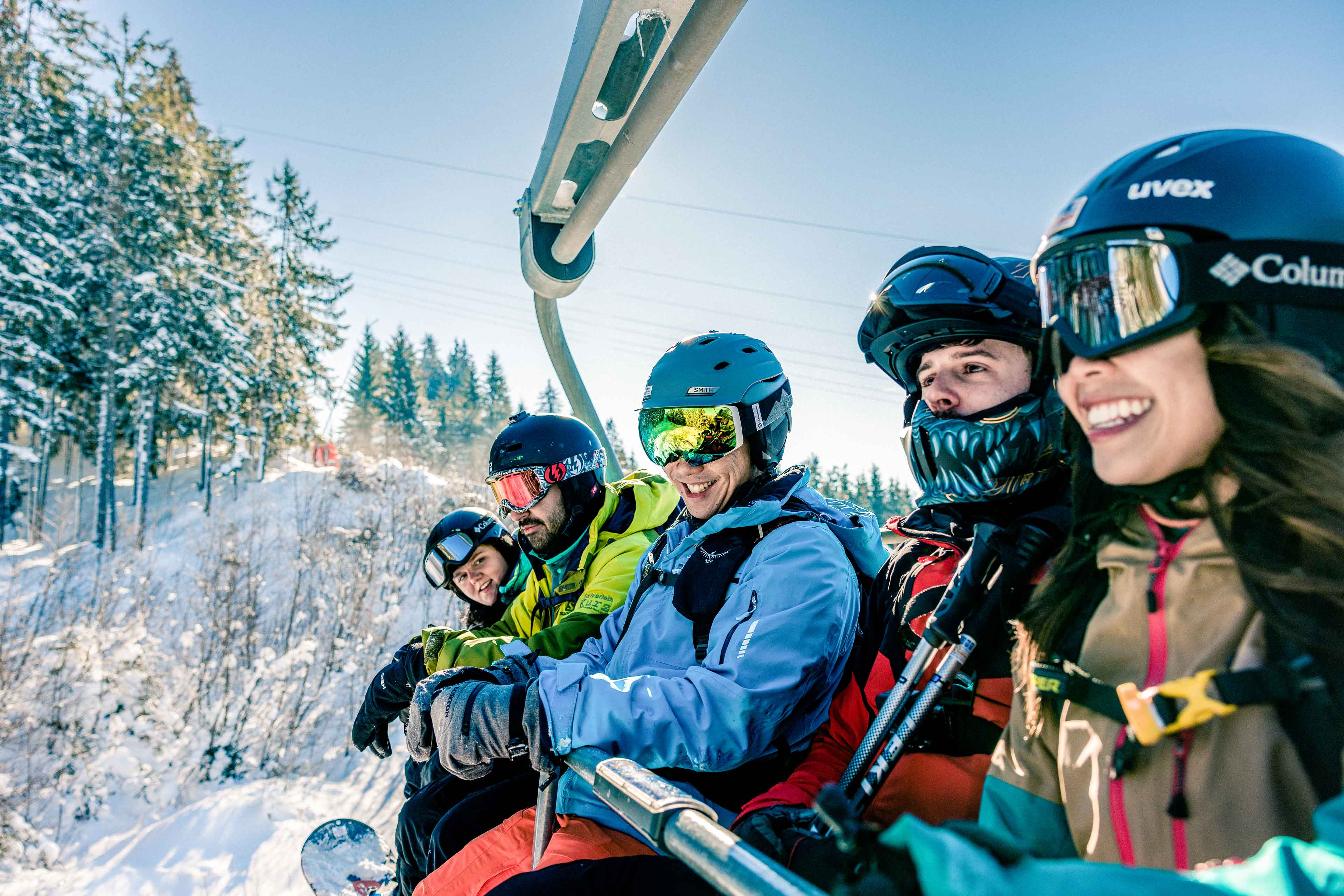 Group Of Skiers Snowboards On Lift Austria 0018EURS2023