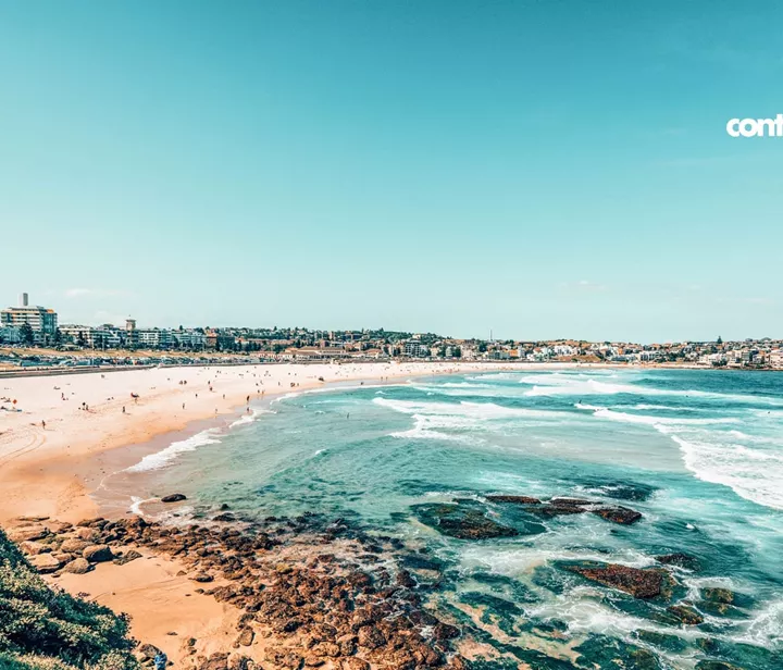 Blue sea and rocky beach in Sydney