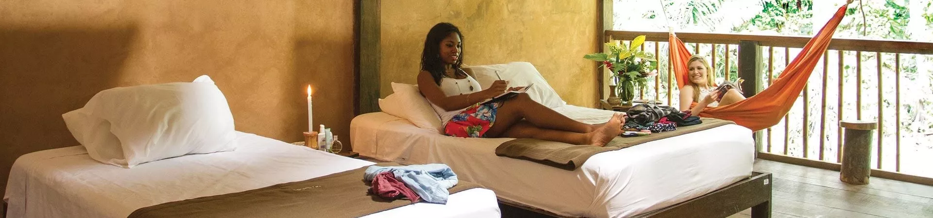 lady sitting on bed in accommodation