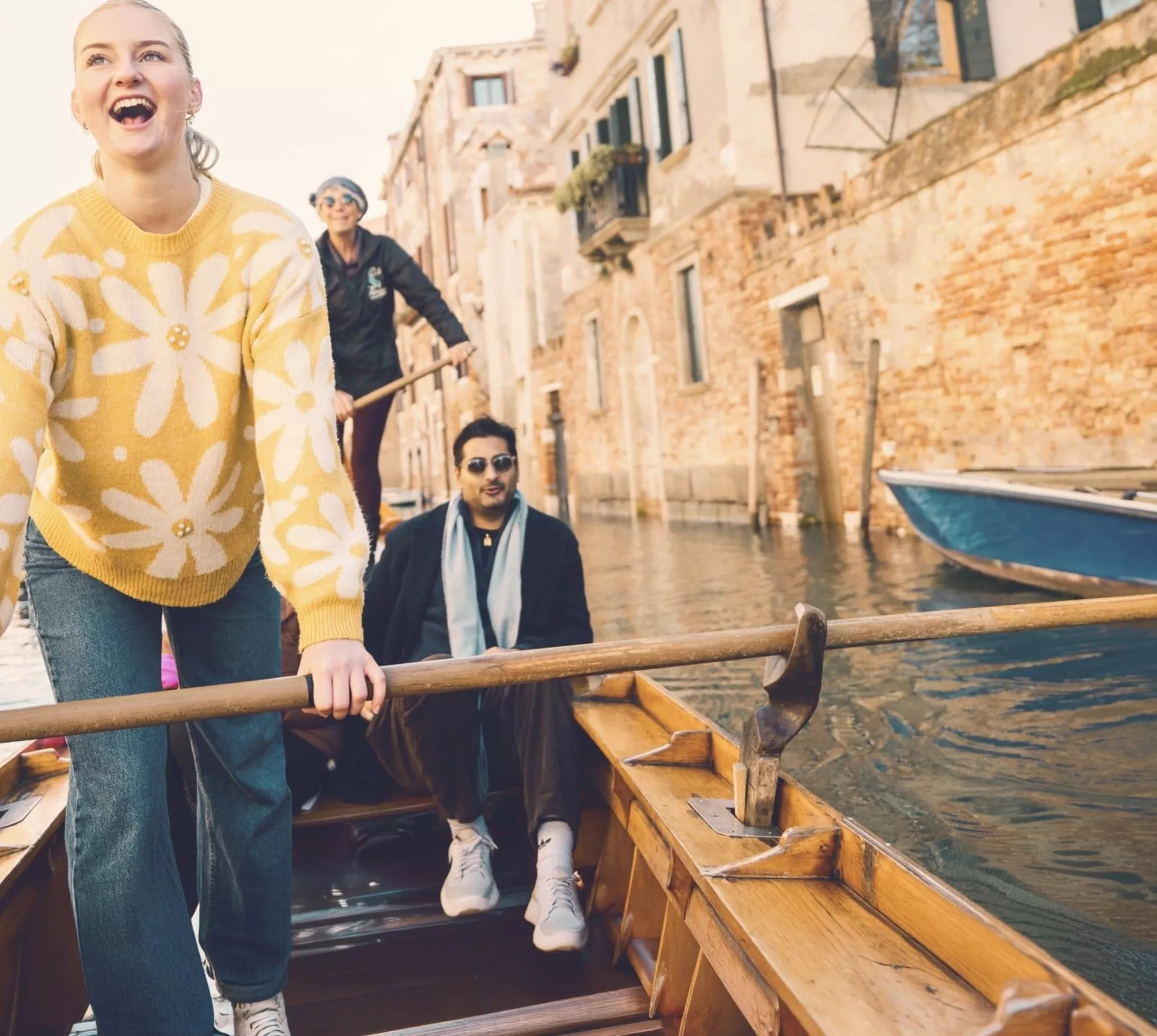 Contiki travellers glide through Venice's canals on a traditional gondola during the London to Rome Quest