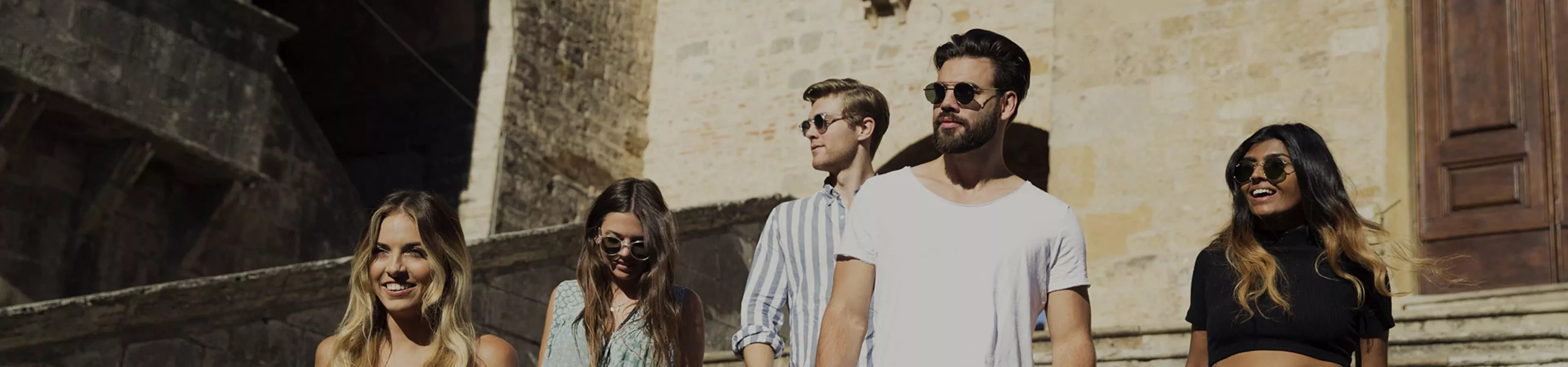 Group of people standing in front of a building in Pompeii
