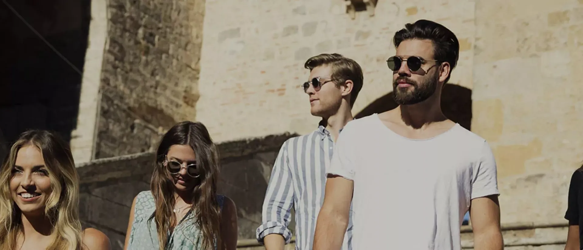 Group of people standing in front of a building in Pompeii