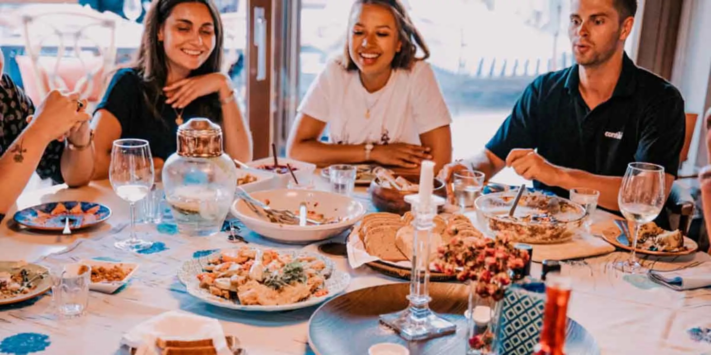 group-of-contiki-travelers-enjoying-dinnerjpg.jpg