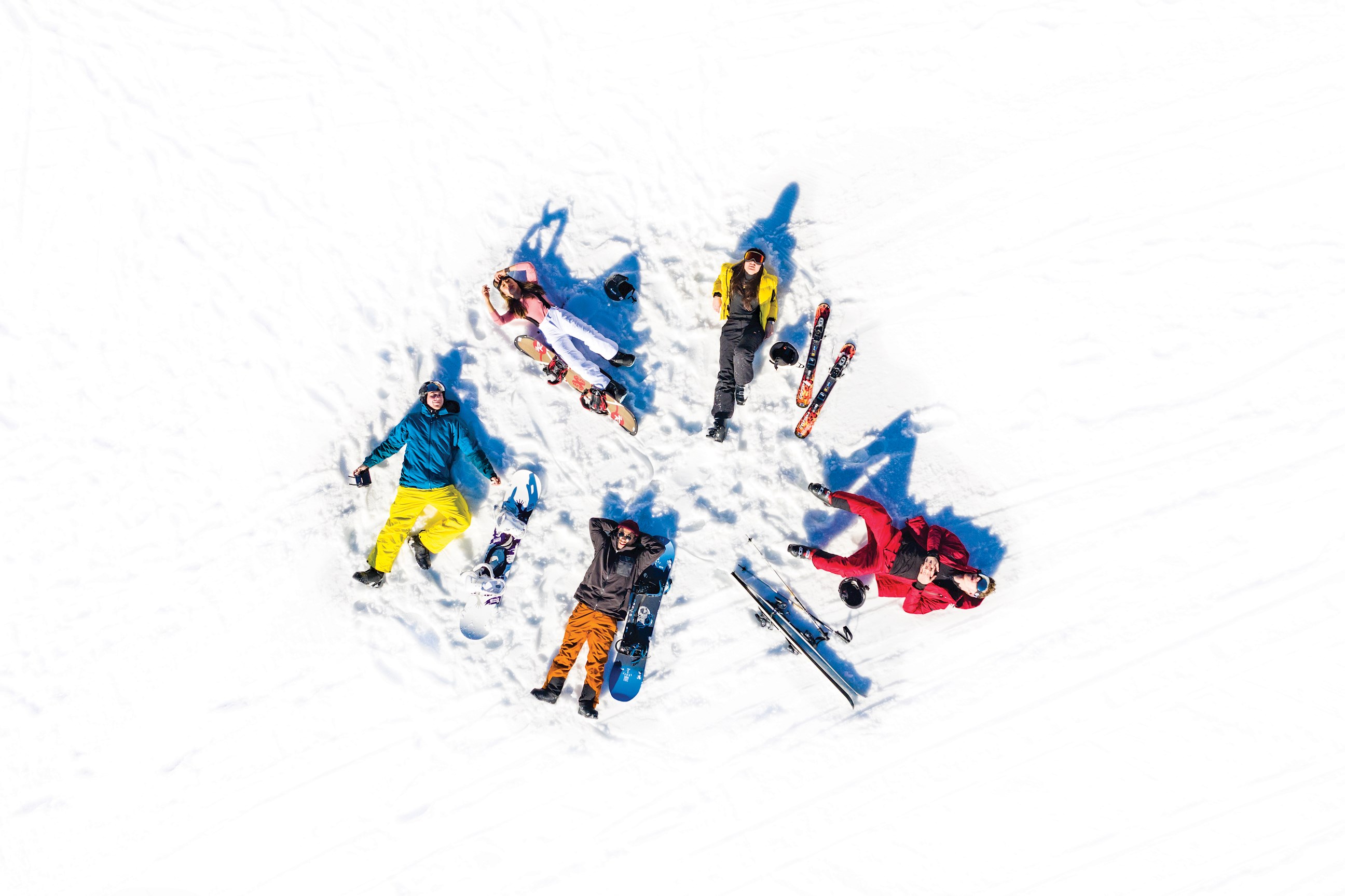 Aerial shot of Travellers making Snow Angels in Hopfgarten, Austria