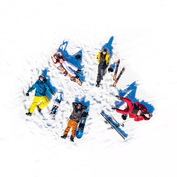 Aerial shot of Travellers making Snow Angels in Hopfgarten, Austria