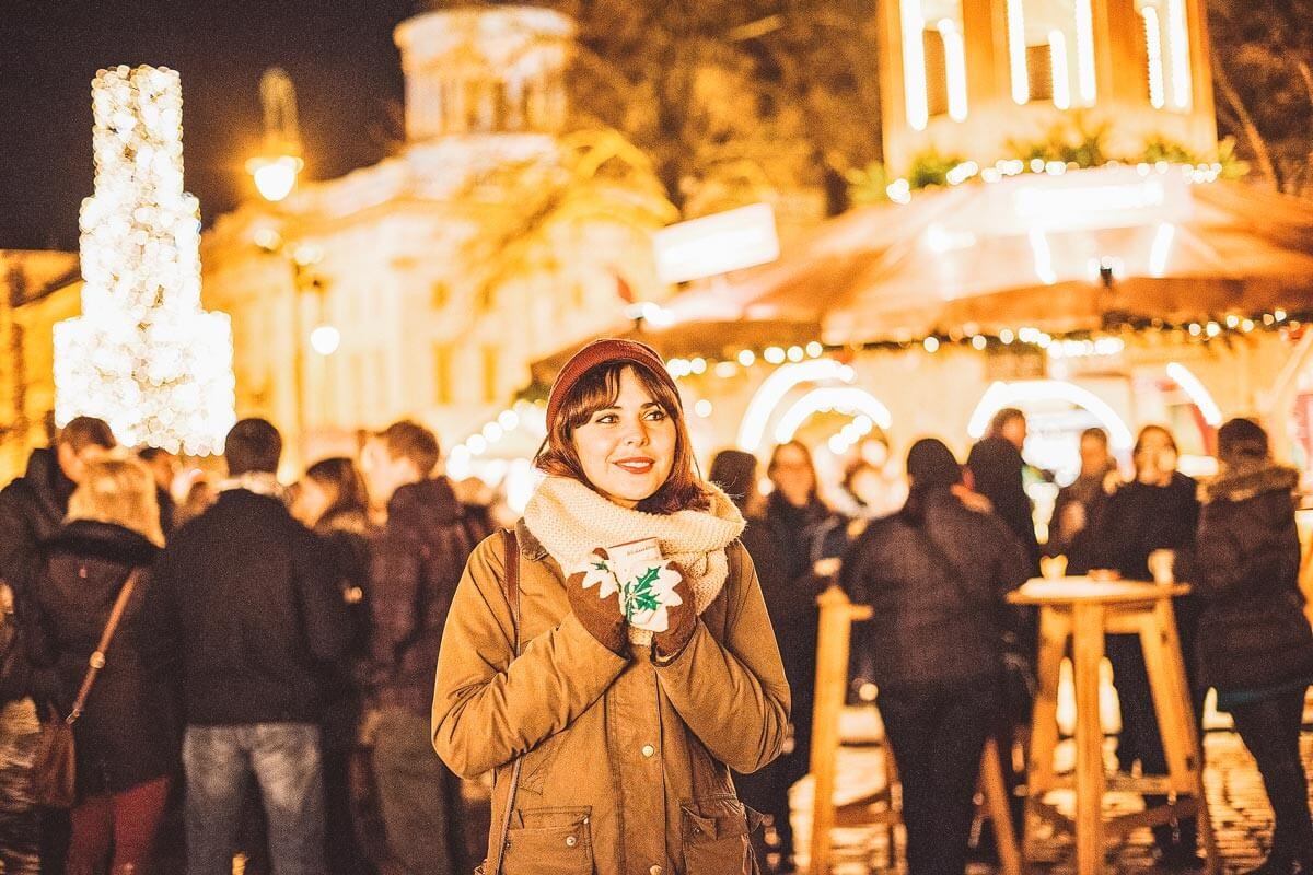 Woman Drinking Hot Chocolate Christmas Market