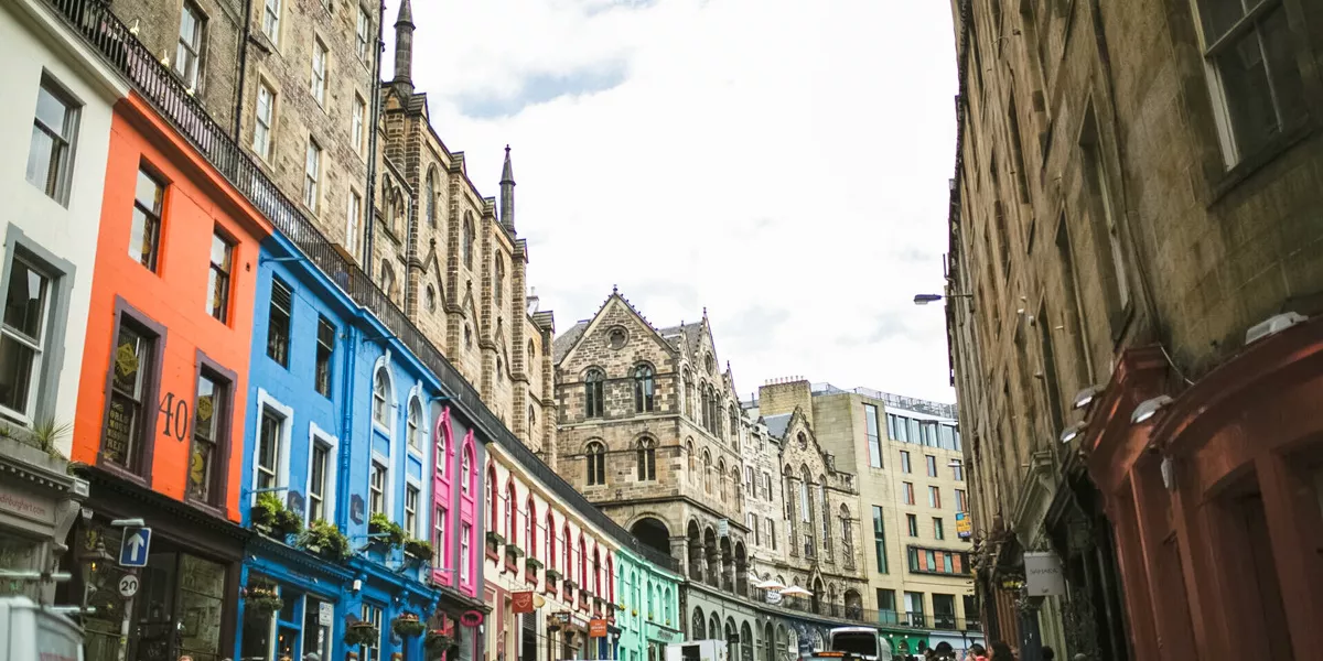 Road With Buildings And Colourful Businesses