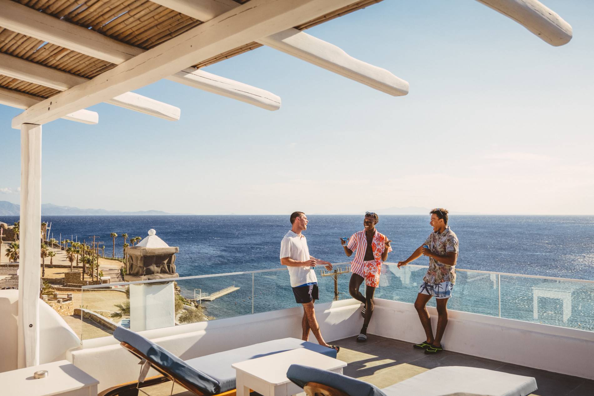 Group of young people chatting on a balcony