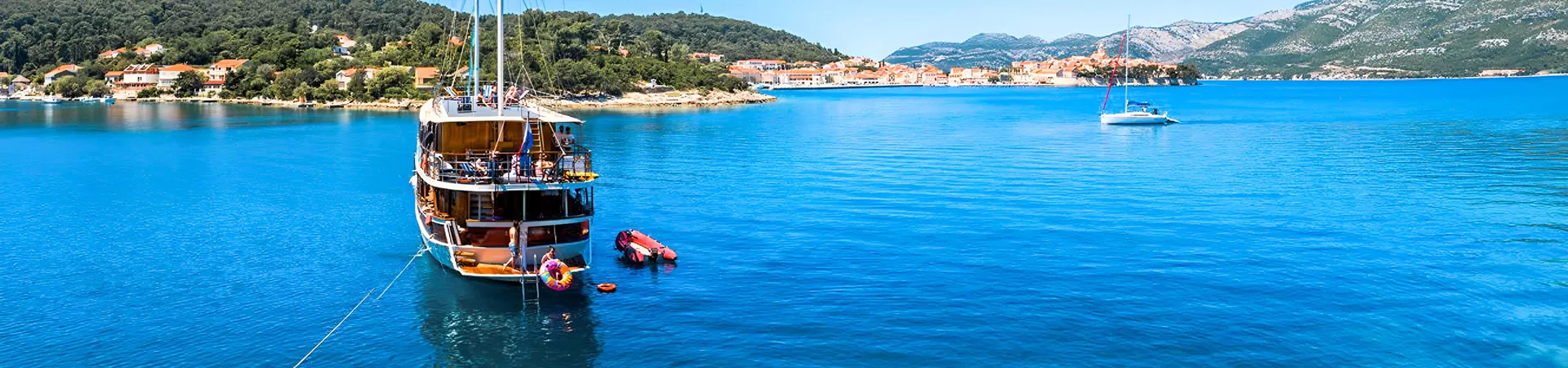 People Enjoying A Sailing Day