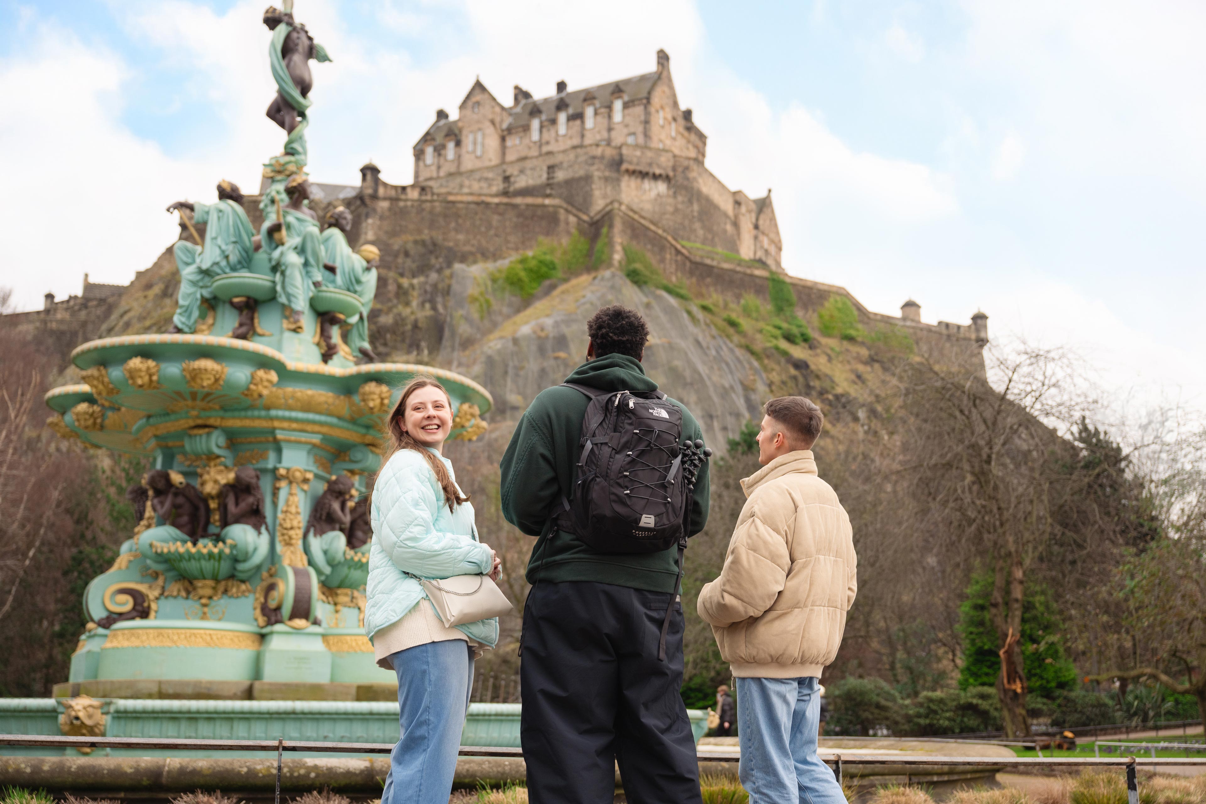 Group Stood Next To Fountain In Scotland