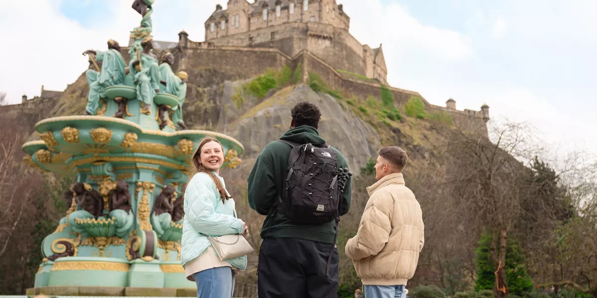 Group Stood Next To Fountain In Scotland