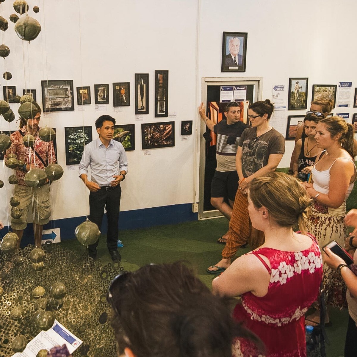 A group of people standing in a room