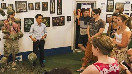 A group of people standing in a room
