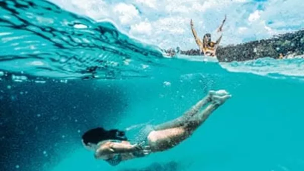 A traveller swimming in Australia