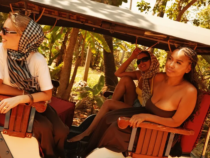 Travellers Riding Tuktuk Siemreap Cambodia