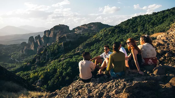 Group Of Friends Enjoying Mountain Landscape