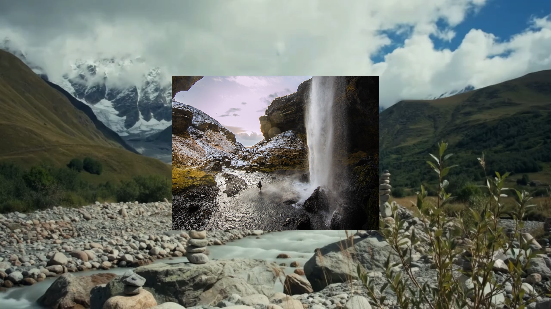 Traveller stands beneath a dramatic waterfall surrounded by rugged mountains, showcasing the adventure of Contiki Outdoors.
