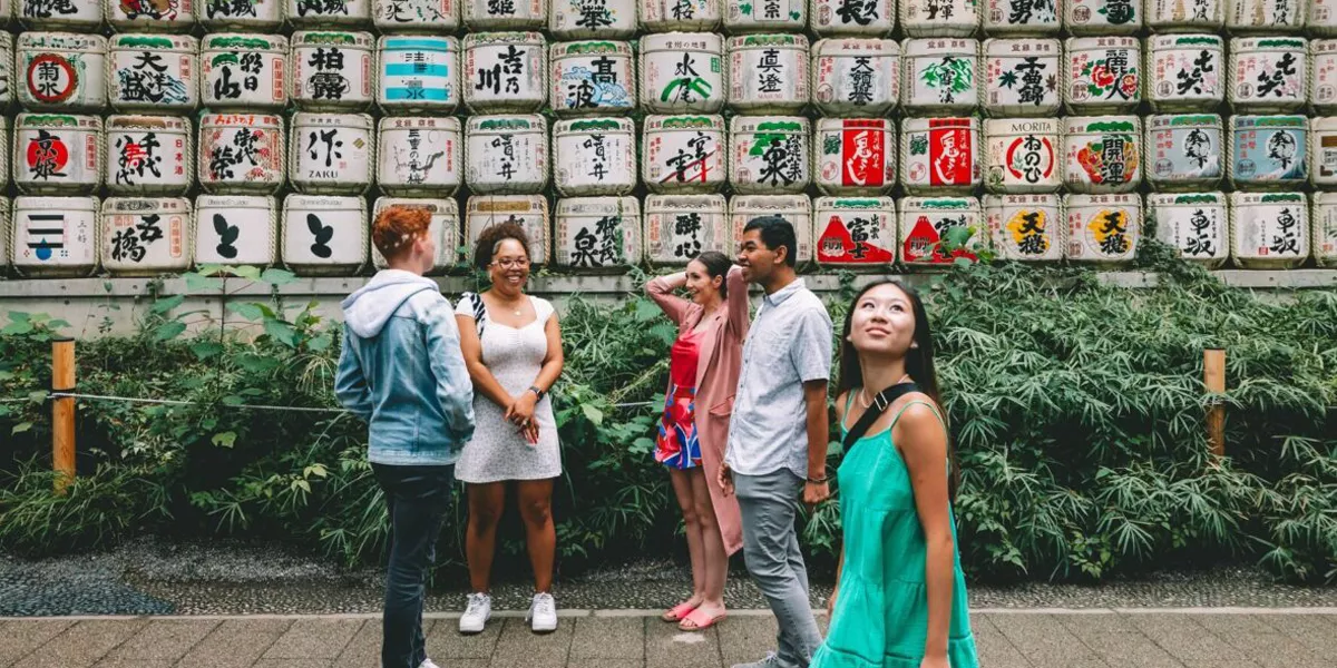 Group Exploring Street In Japan
