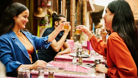 Friends drinking tea at a restaurant in Morocco