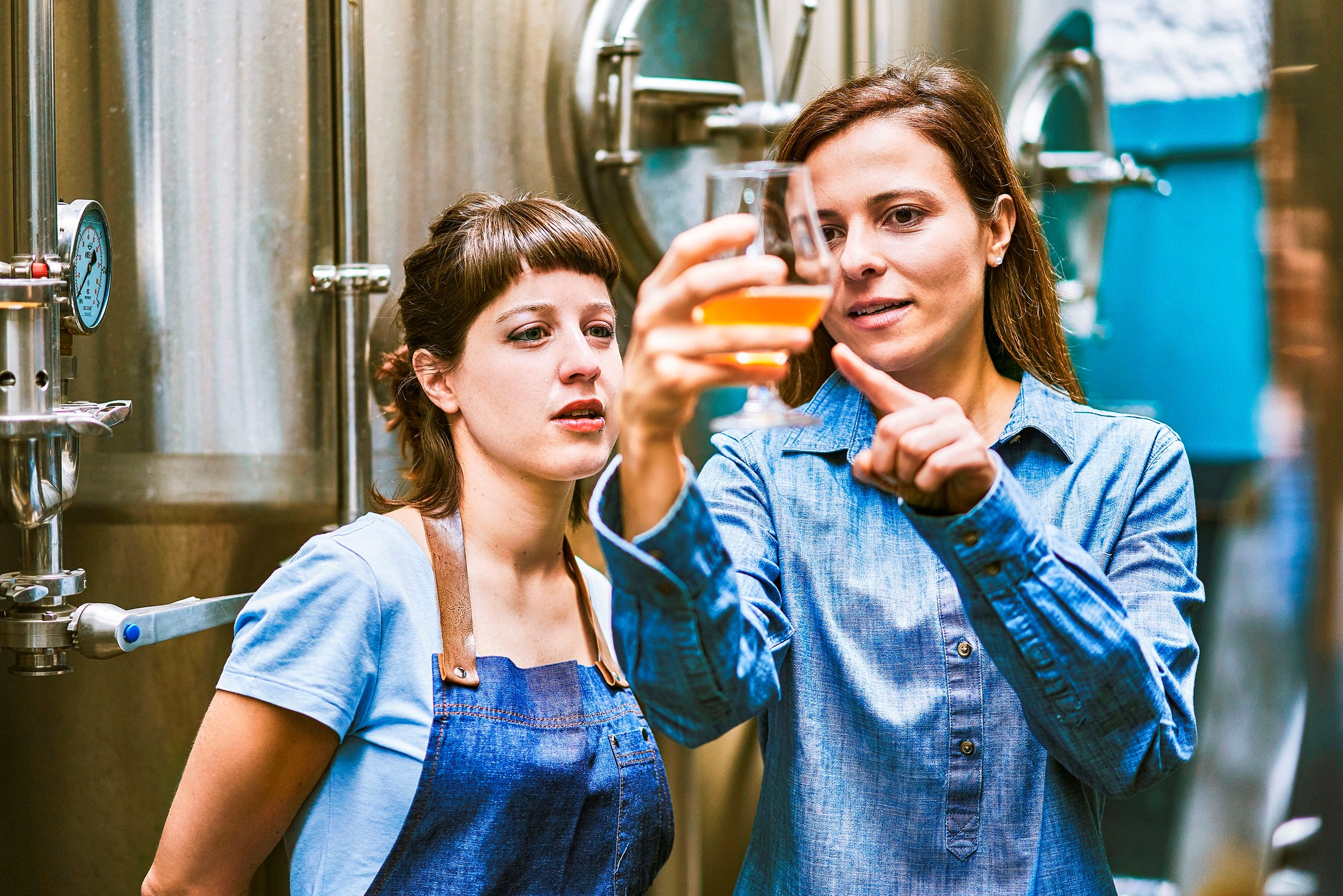ottawa-brew-donkey-brewery-tour-hispanic-women-checking-quality-of-craft-beer-in-brewery-gettyimages-1184808099.jpg