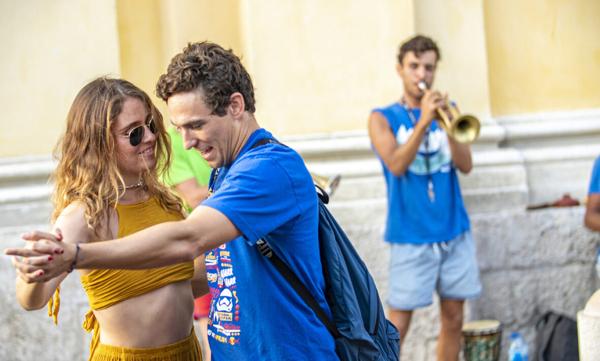 Couple Dancing In Street