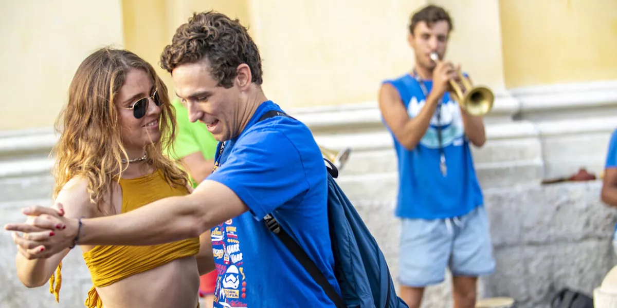 Couple Dancing In Street