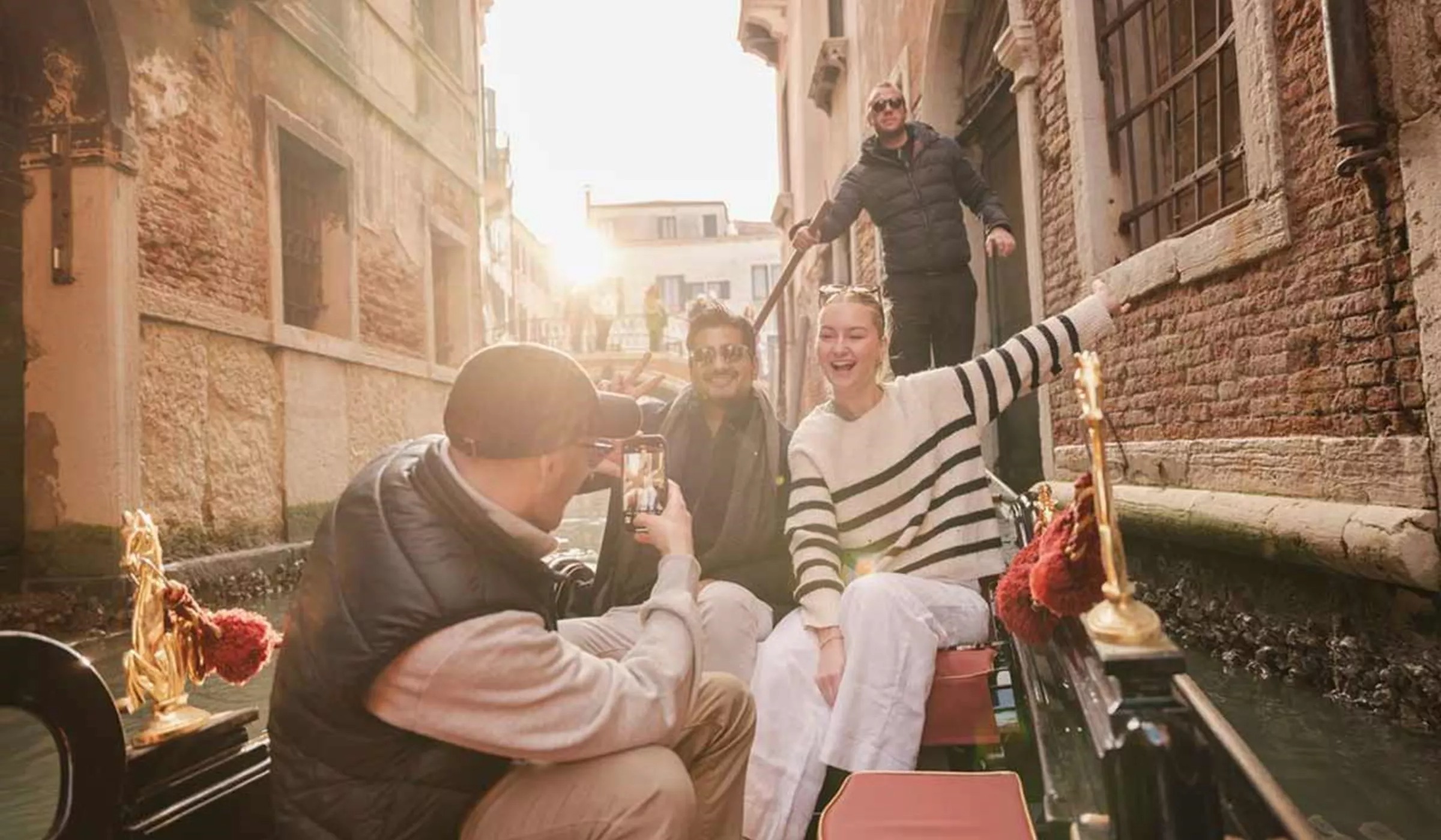 Group Of Friends Enjoying A Boat Ride Italy