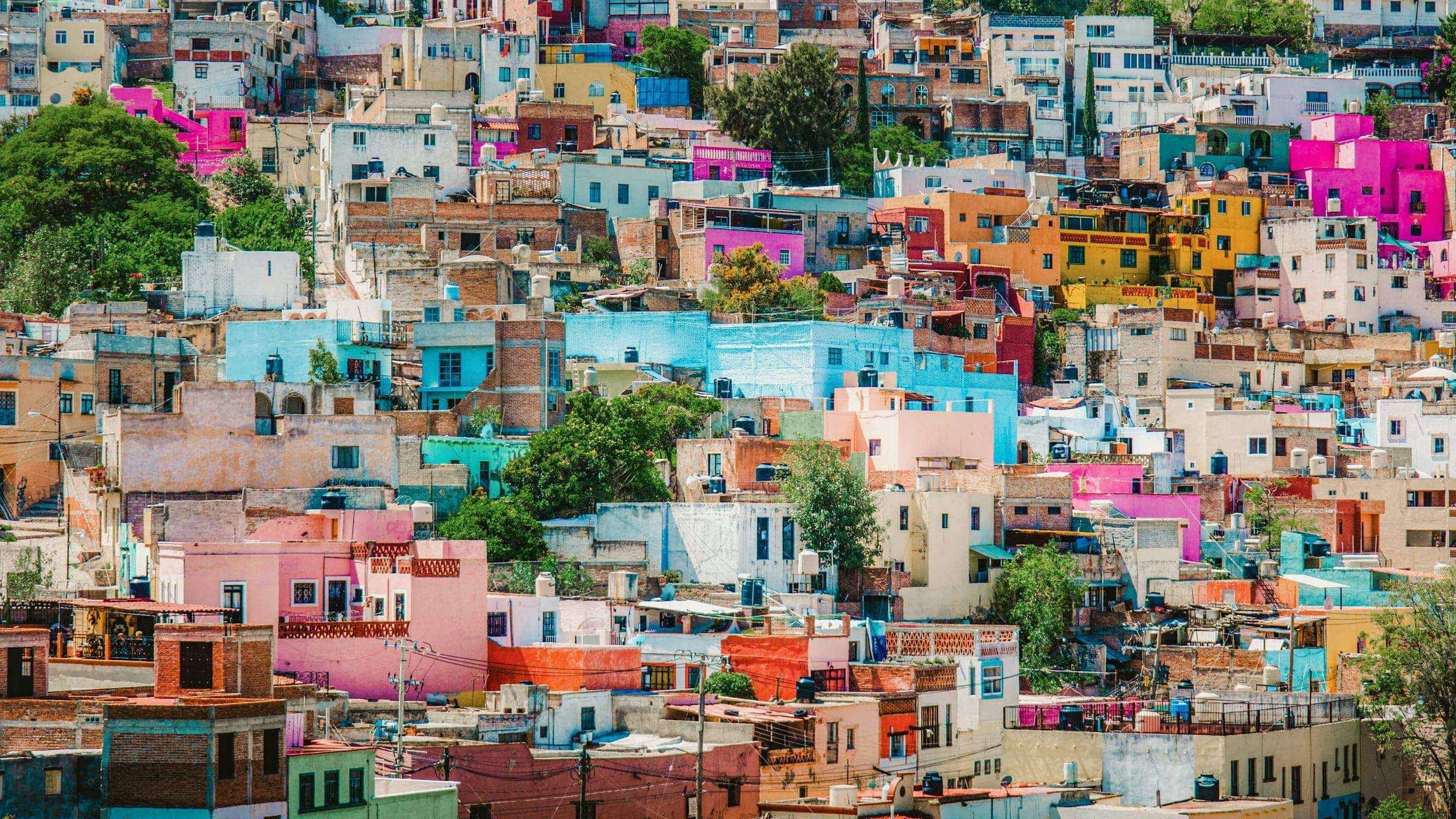 Colourful hillside homes in Guanajuato, Mexico - Contiki Mexico Grande Tour