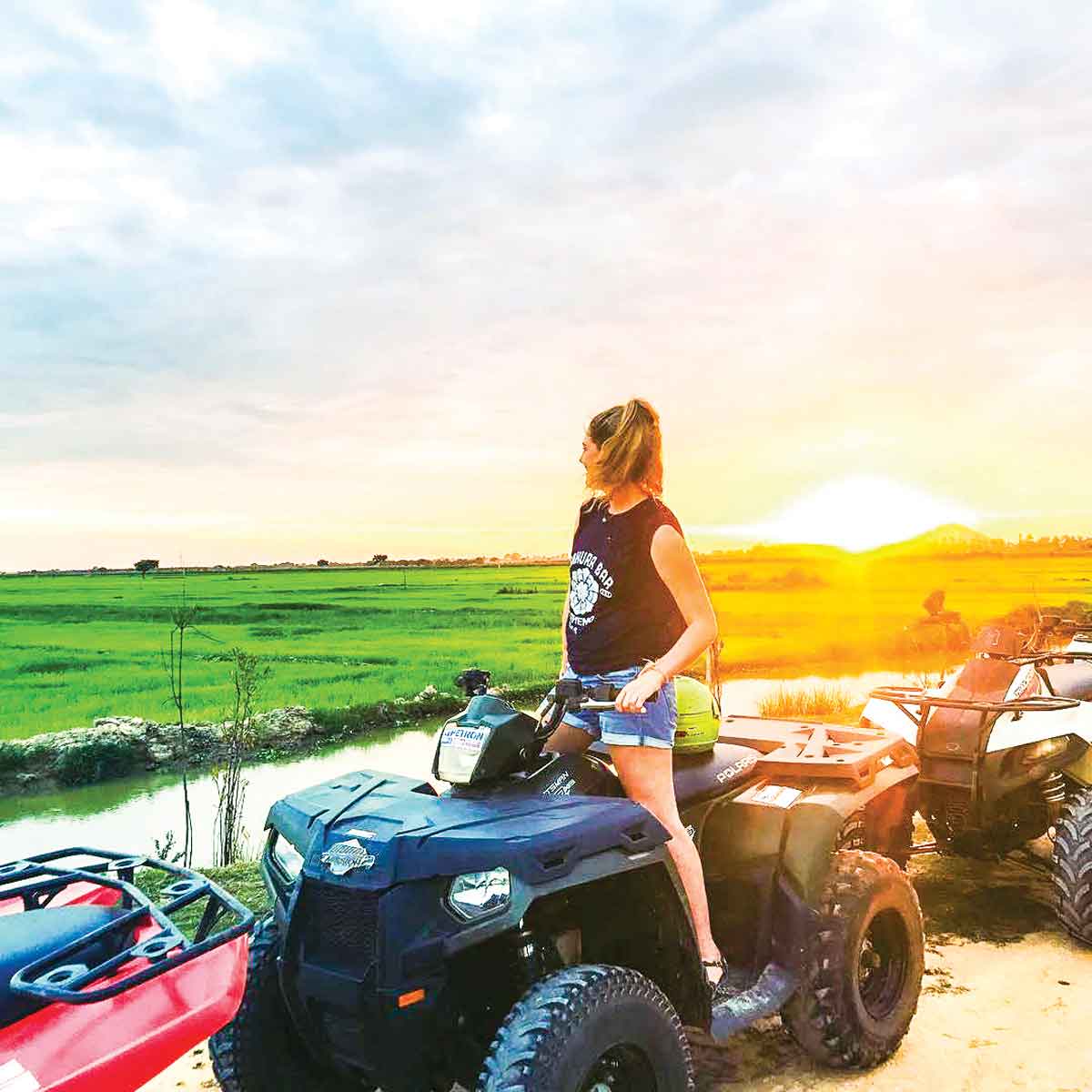 Tourist in Cambodia on quad bikes