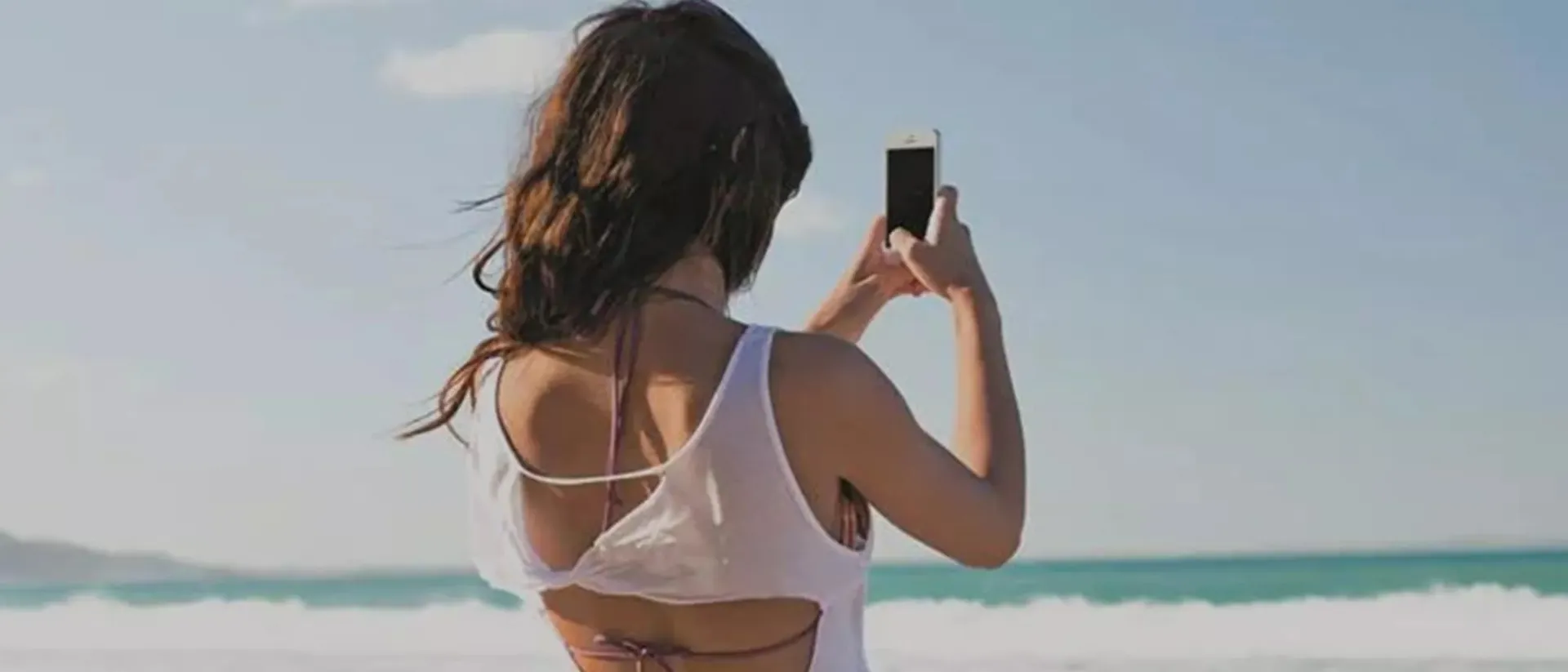 Traveller taking picture in Fraser Island