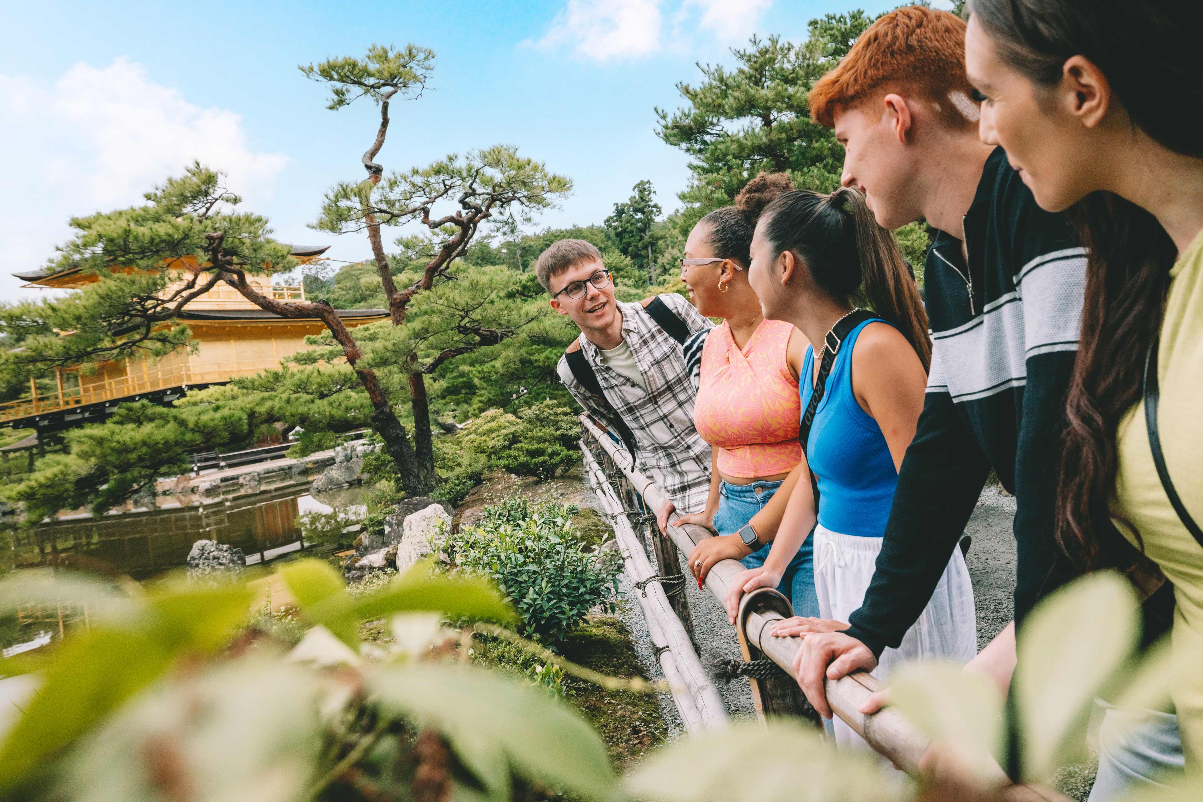 Small Group Looking At Garden