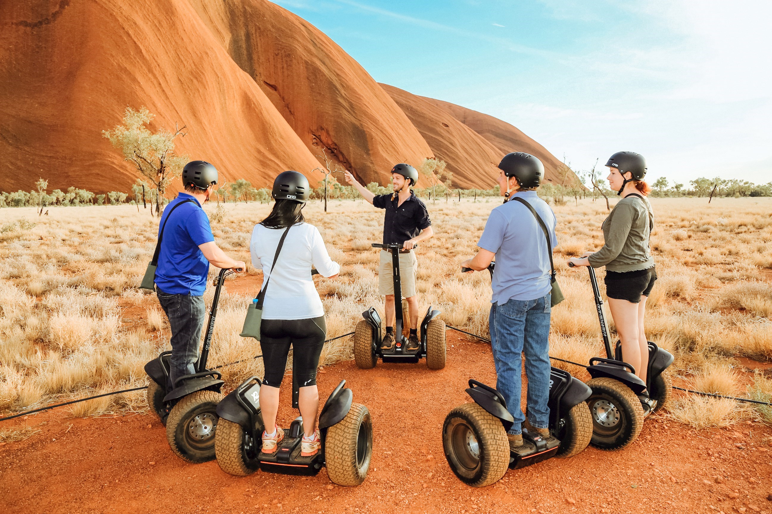 Travellers on Segway's at Uluru in Australia