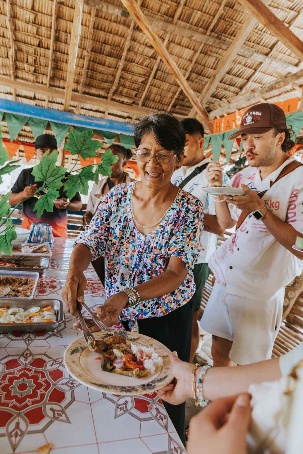 Happy Woman Serving A Variety Of Food