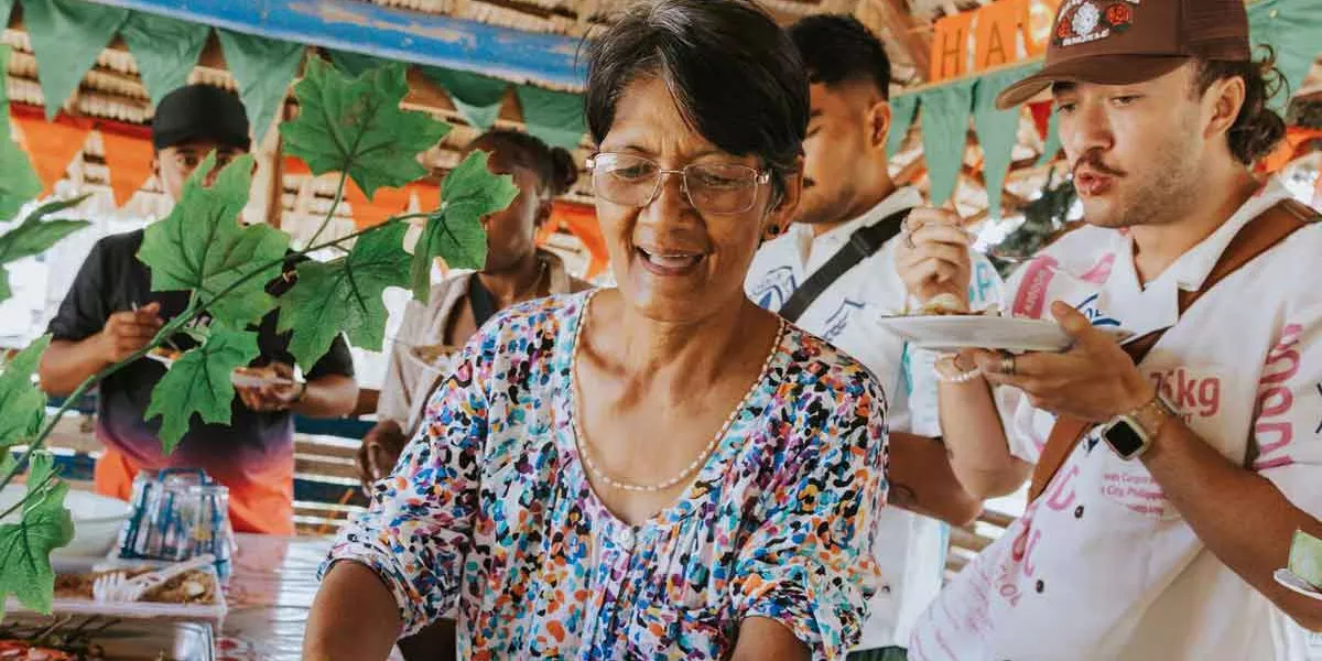 Happy Woman Serving A Variety Of Food