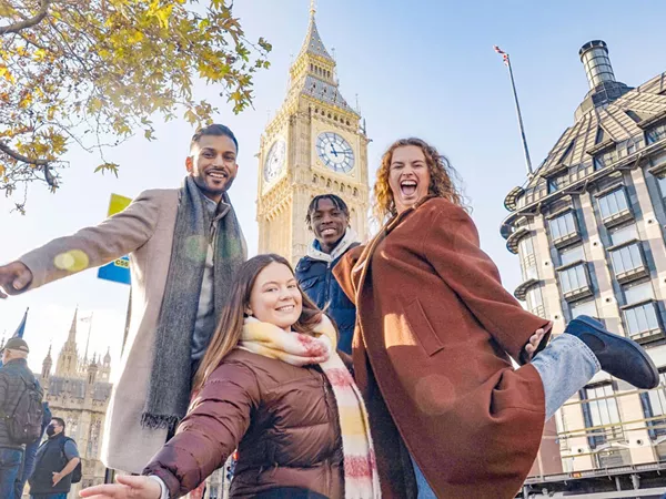 Group Of Friends Smiling Big Ben At The Back