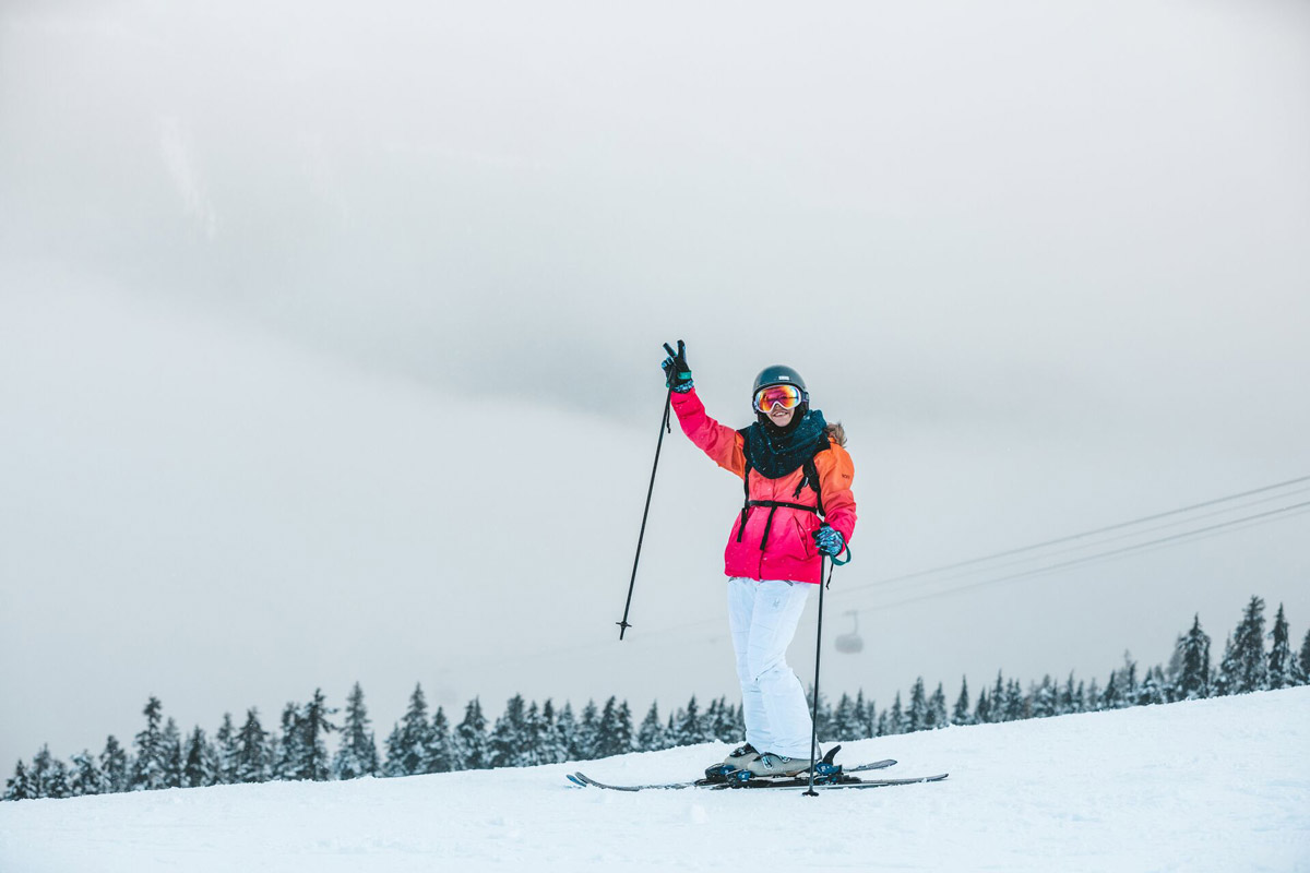 Person Skiing And Smiling