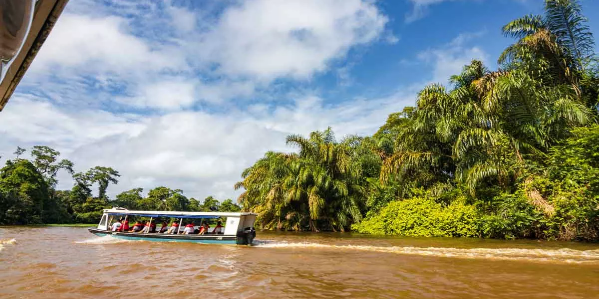 Travelers On A Boat On Lake