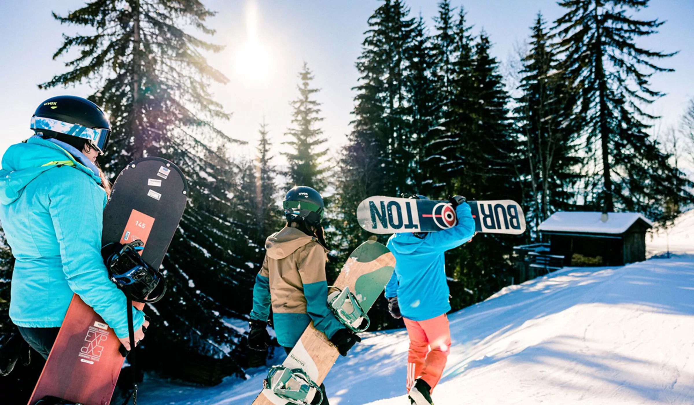 People With Snowboards On Mountain Austria