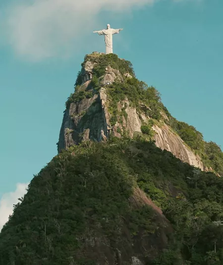 Christ the Redeemer overlooks Rio de Janeiro from Corcovado Mountain on the Contiki Best of Argentina & Brazil Tour