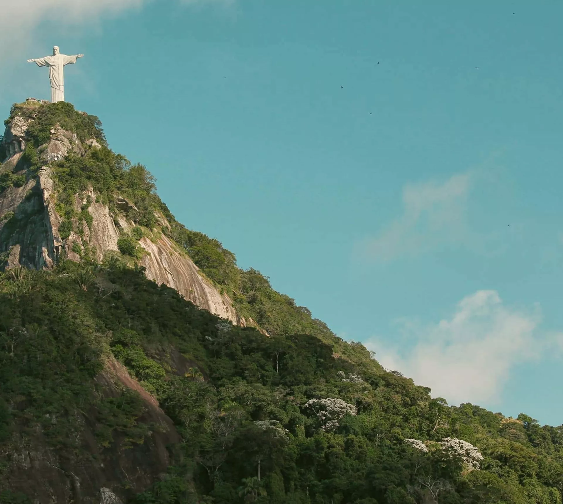 Christ the Redeemer overlooks Rio de Janeiro from Corcovado Mountain on the Contiki Best of Argentina & Brazil Tour