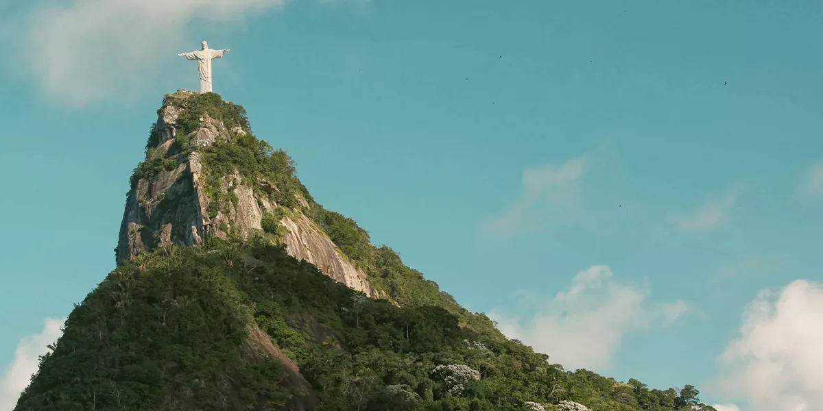 Christ the Redeemer overlooks Rio de Janeiro from Corcovado Mountain on the Contiki Best of Argentina & Brazil Tour