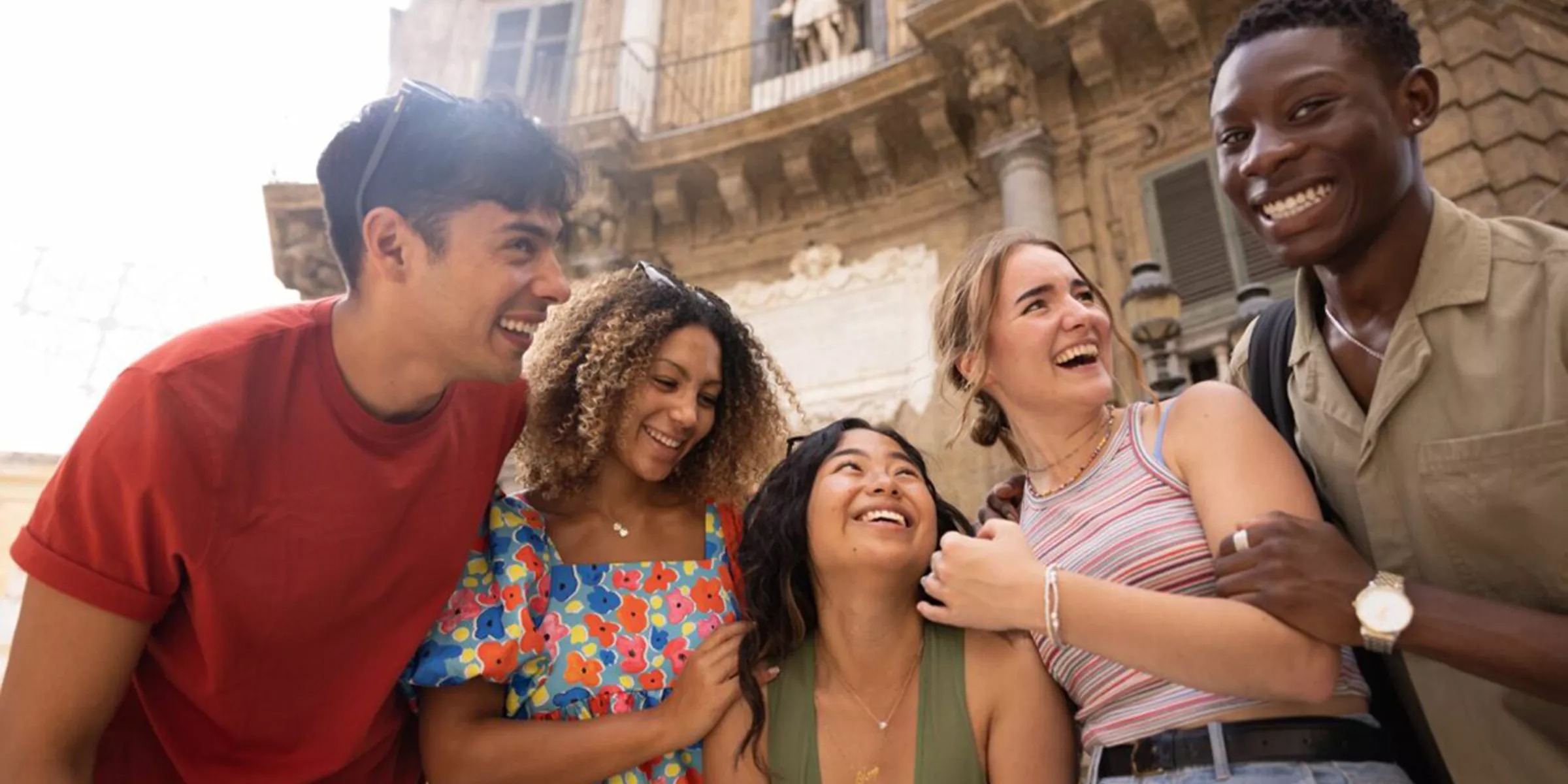 Group Of Friends Laughing In Italy 