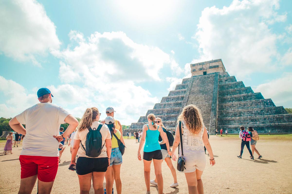 Mexico Landscape Group Of Young People Walking Close By