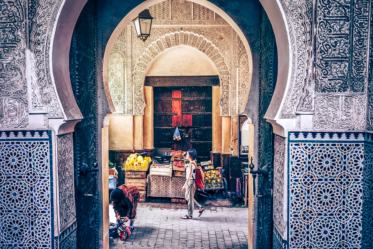 Woman Walking In A Road Large Door Morocco Patterns On Wall
