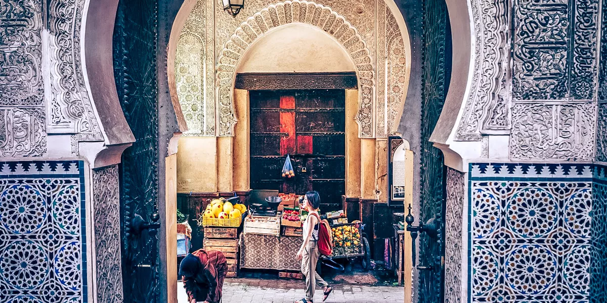 Woman Walking In A Road Large Door Morocco Patterns On Wall