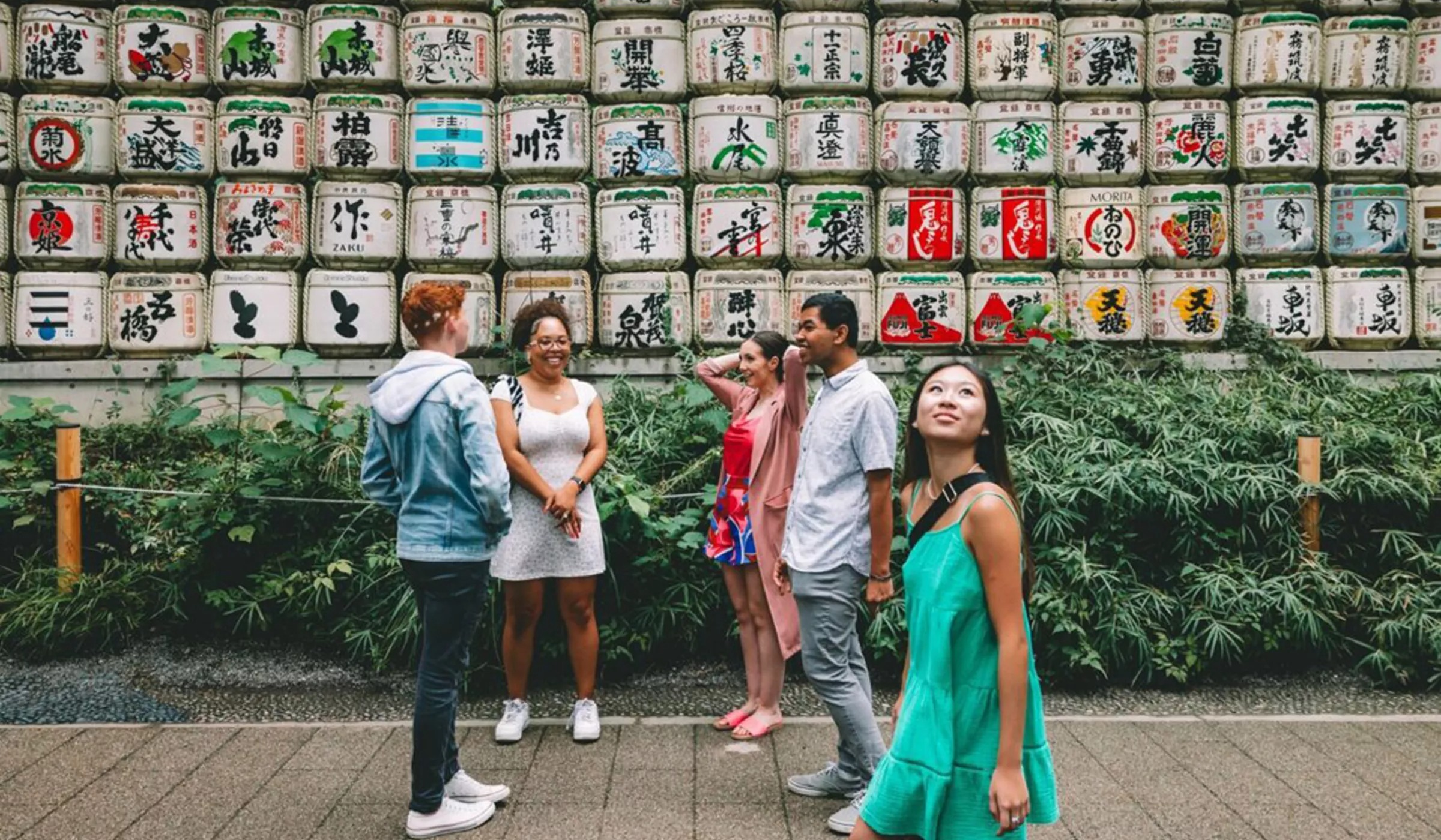 Group Exploring Street In Japan
