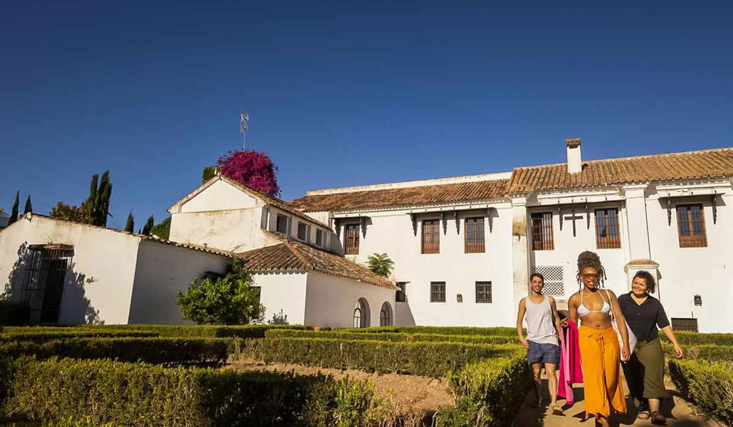 Travelers Outside Villa In Portugal