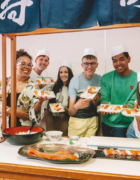 Young Travellers Making Sushi