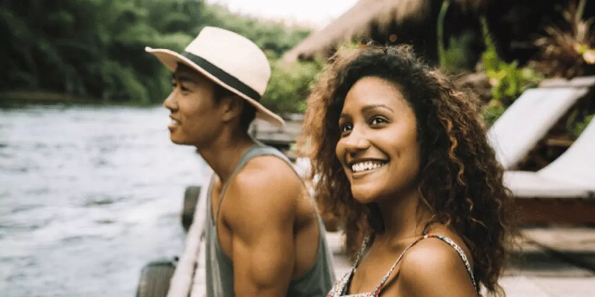 People by a river in Thailand