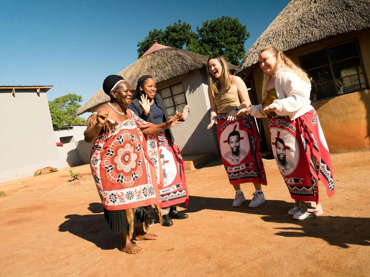 Four Women Dancing